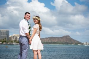 Newlywed couple after having ceremony performed buy a hawaii ordained minister