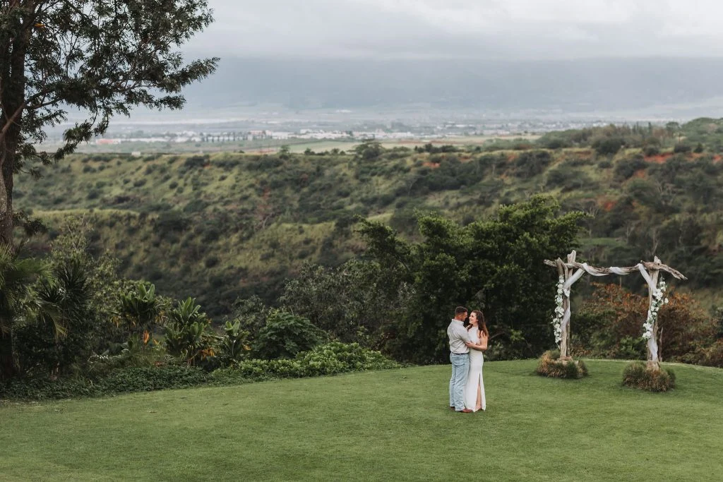 Couple embracing at outdoor wedding