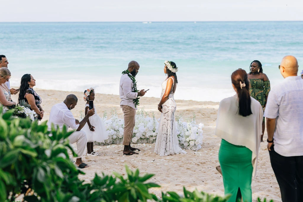 Beachside wedding ceremony with loved ones