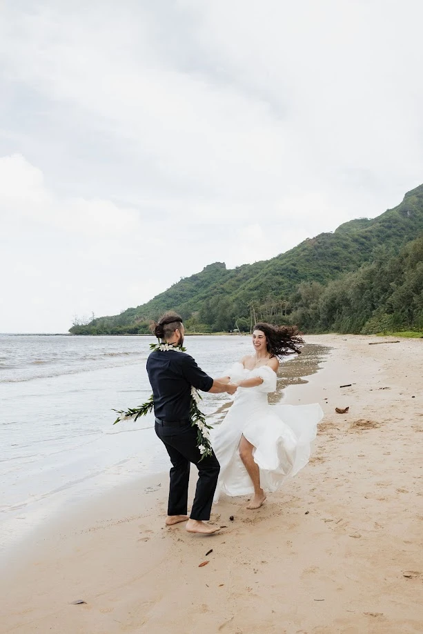 Couple dancing at beach