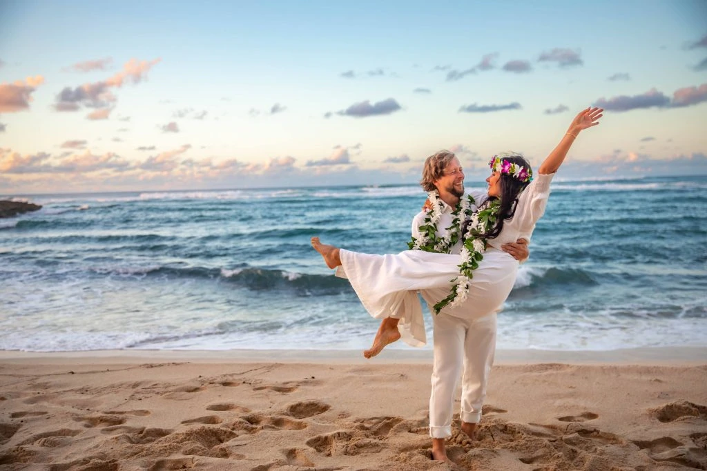 Couple celebrating on the beach
