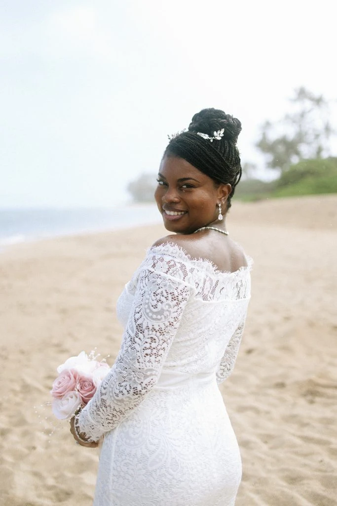 Bride holding flowers in hand