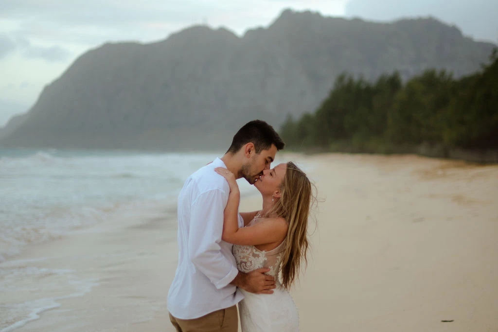 Couple kissing on beach
