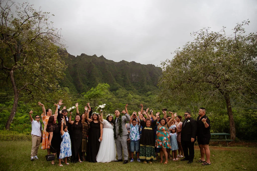 Wedding group celebrating outdoors