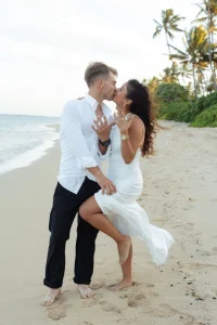 Couple kissing on beach