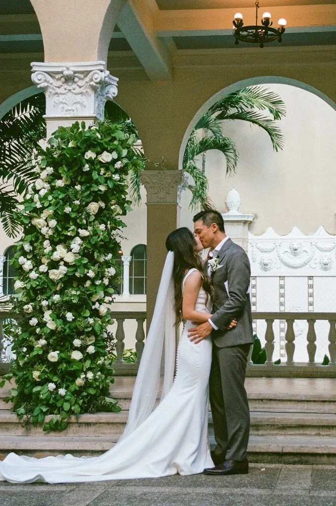 Couple kissing at their wedding ceremony