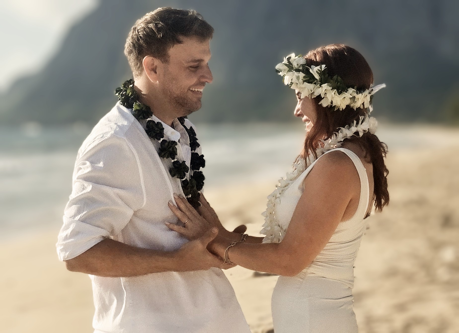 Close-up of traditional Hawaiian lei exchange on Oahu