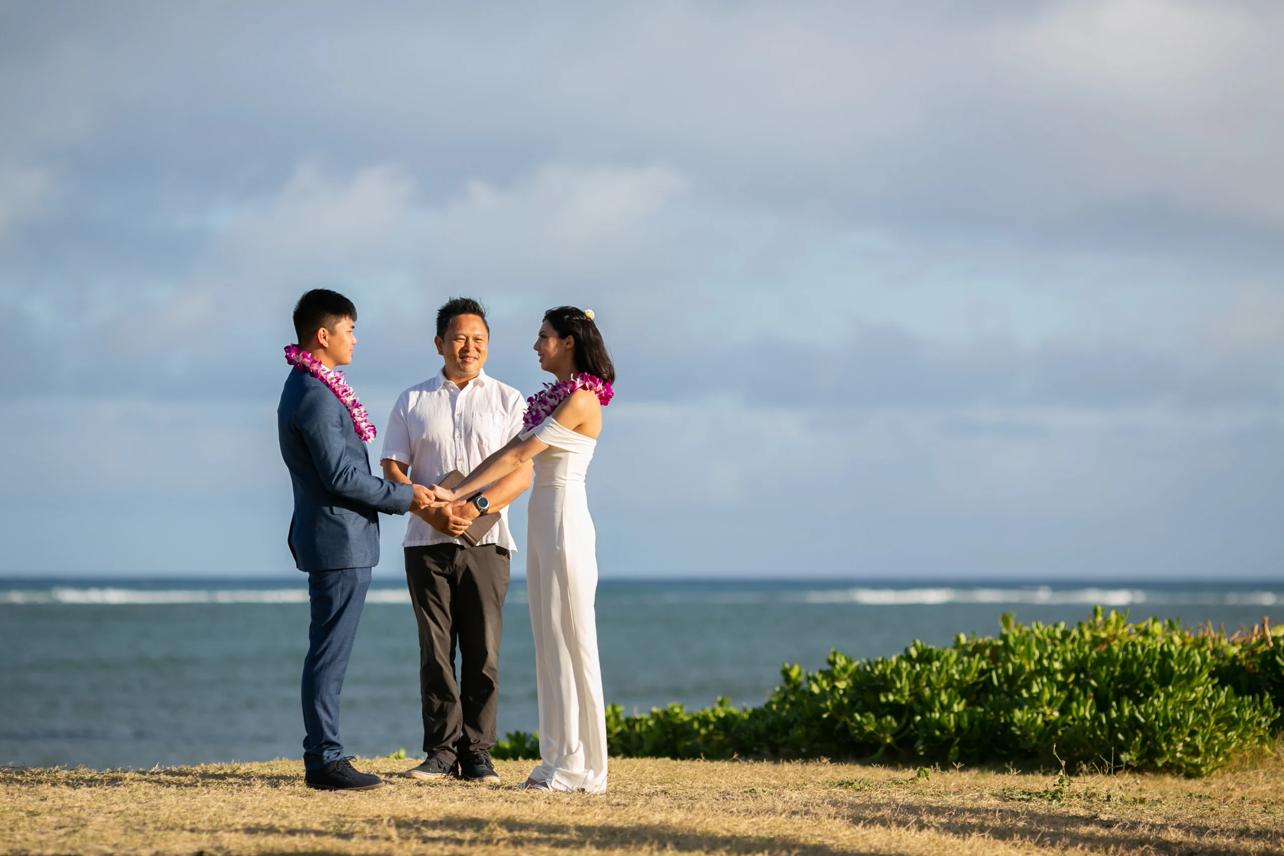 Rev. James Chun officiating a ceremony on Oahu for a couple completing Hawaii marriage and immigration licensing